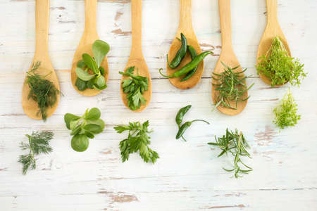 Spices and herbs on wooden backgroundの写真素材
