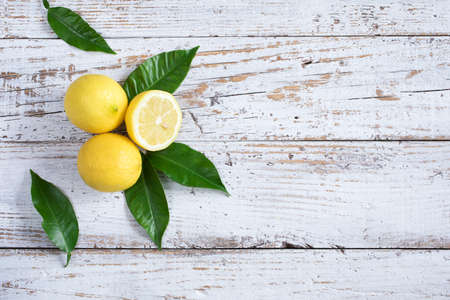 Lemons on wooden tableの写真素材