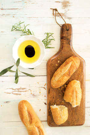Freshly baked bread on wooden tableの写真素材
