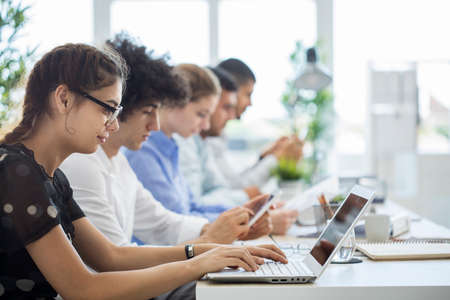 Businesspeople working  in officeの写真素材