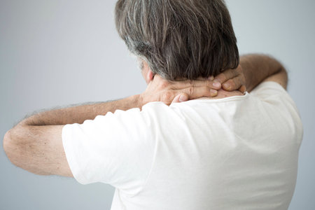 Old man with neck painの写真素材
