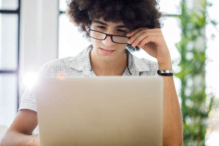 Young man working with computer