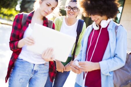 Young students on campusの写真素材