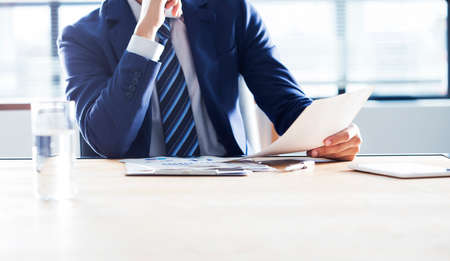 Business man working in the officeの写真素材