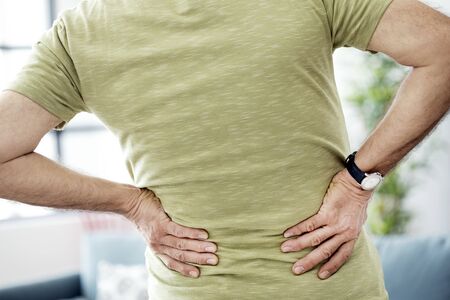 Old man with back pain