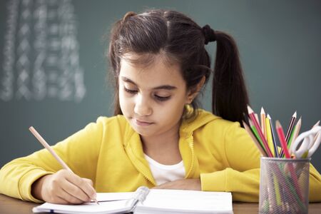 School child in classroom