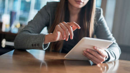 Businesswoman using digital tablet in officeの写真素材