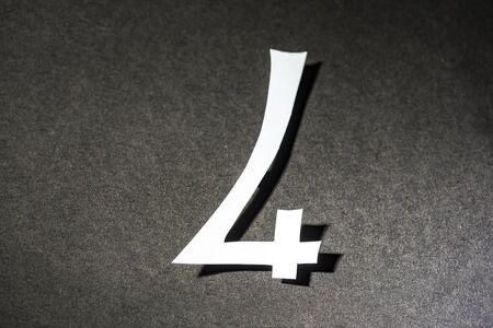 Number four on the black backgroundの写真素材