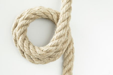 Beige cotton rope curl isolated on white colorの写真素材