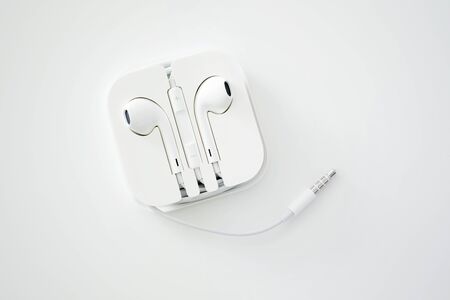 White earphone set on isolated white color