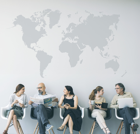 Group of people sitting on chairsの写真素材