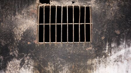 Iron window, dirty black color wallの写真素材