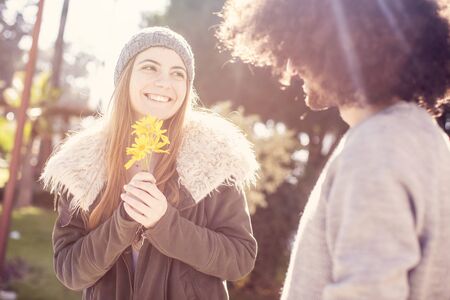 Young couple in love, outside, natureの写真素材