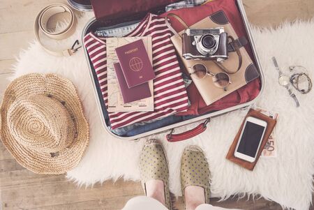 Travel suitcase preparing conceptの写真素材