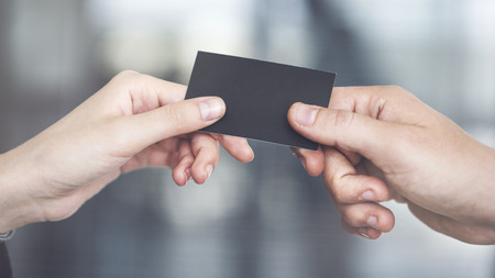 People are exchanging business cardの写真素材