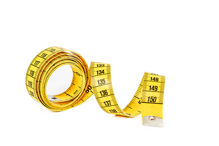 Tape measure isolated on whiteの写真素材