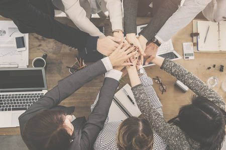 People bringing their hands together