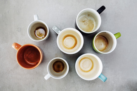 Many empty cups of coffee top viewの写真素材