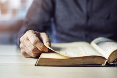 Man reading book close up viewの写真素材