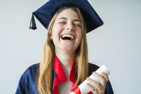 Young female student graduating from universityの写真素材