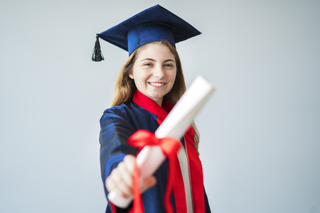 Young female student graduating from universityの写真素材