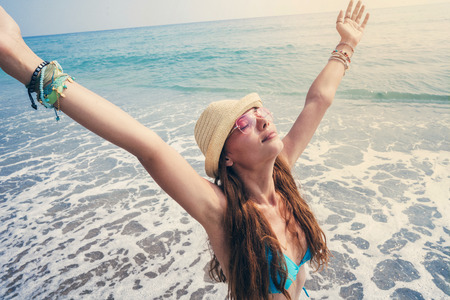 Beautiful young woman on beach