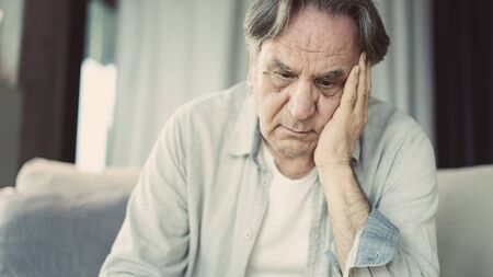 Portrait of thoughtful senior man