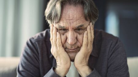 Portrait of thoughtful senior manの写真素材