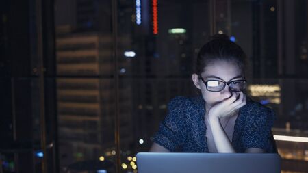 Working on computer at night