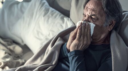Senior man suffering from coldの写真素材