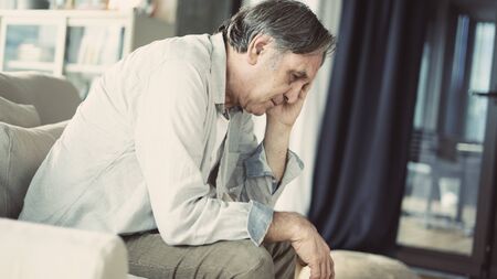 Portrait of thoughtful senior manの写真素材