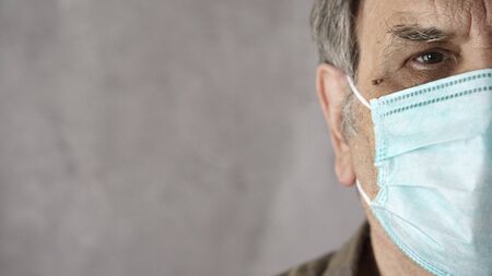 Old man wearing medical mask