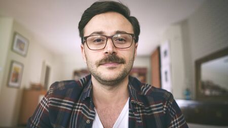 Talking and working on the computerの写真素材