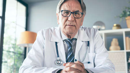 Talking by video call on computerの写真素材