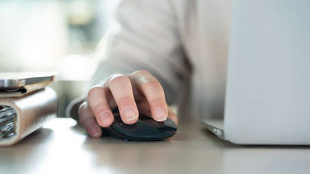 Woman hands on laptop keyboard