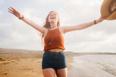 Young woman at the beachの写真素材