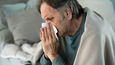 Old man suffering from cold