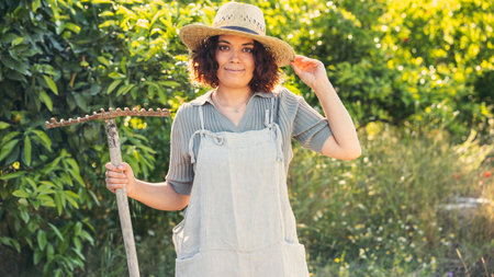 Young woman in the gardenの写真素材