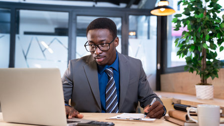 Businessman working on computer in office