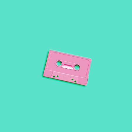Pastel retro realistic cassette on flat background, vector illustrationのイラスト素材