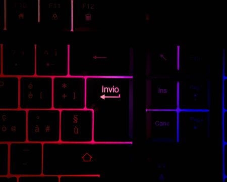 Enter key button in back lit keyboard computer