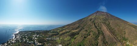 Panoramic on Stromboli island from above - Aerial Landscape with volcano and blu sky and seaの写真素材