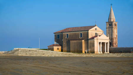 Sanctuary Madonna dell'Angelo seen during sunset in a blue sky backgroundの写真素材