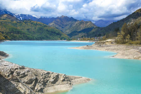Barcis alpine lake with cloudy sky at Valcellina-Prodenone, Italy attractions on Dolomitesの写真素材