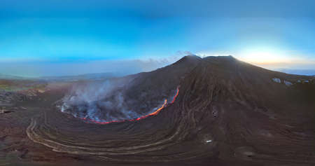Etna erupting view from above- Aerial panorama at sunset