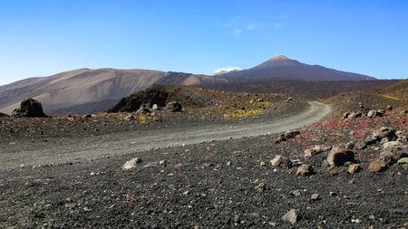 Etna volcano crater - landscape summer time during sunny day with blue skyの写真素材