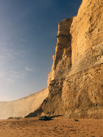 The Twelve Apostles are a collection of limestone stacks off the shore of Port Campbell National Park, by the Great Ocean Road in Victoria, Australia. Here, we climbed down to Ocean Level and walked the shore.の写真素材