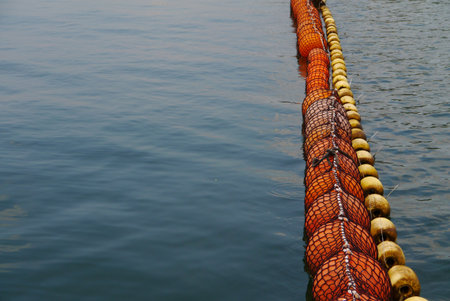 Bright lines of bouys note areas for swimming, fishing, and boating. Repulse Bay Hong Kong 2013の写真素材