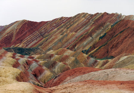 Sitting on the edge of the Silk Road, Zhangye Danxia National Geological Park sits within northwest China's Gansu Province. Desert winds painted this masterpiece over the milenia.の写真素材
