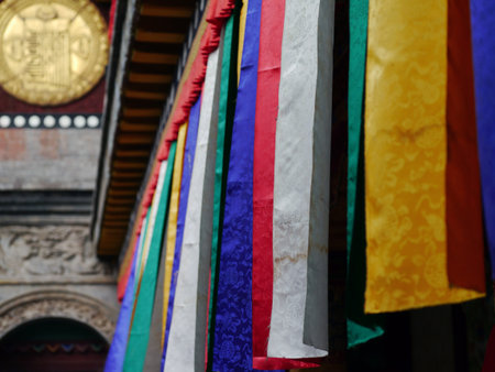 Prayer flags or fabrics adorn the temple's interior.の写真素材